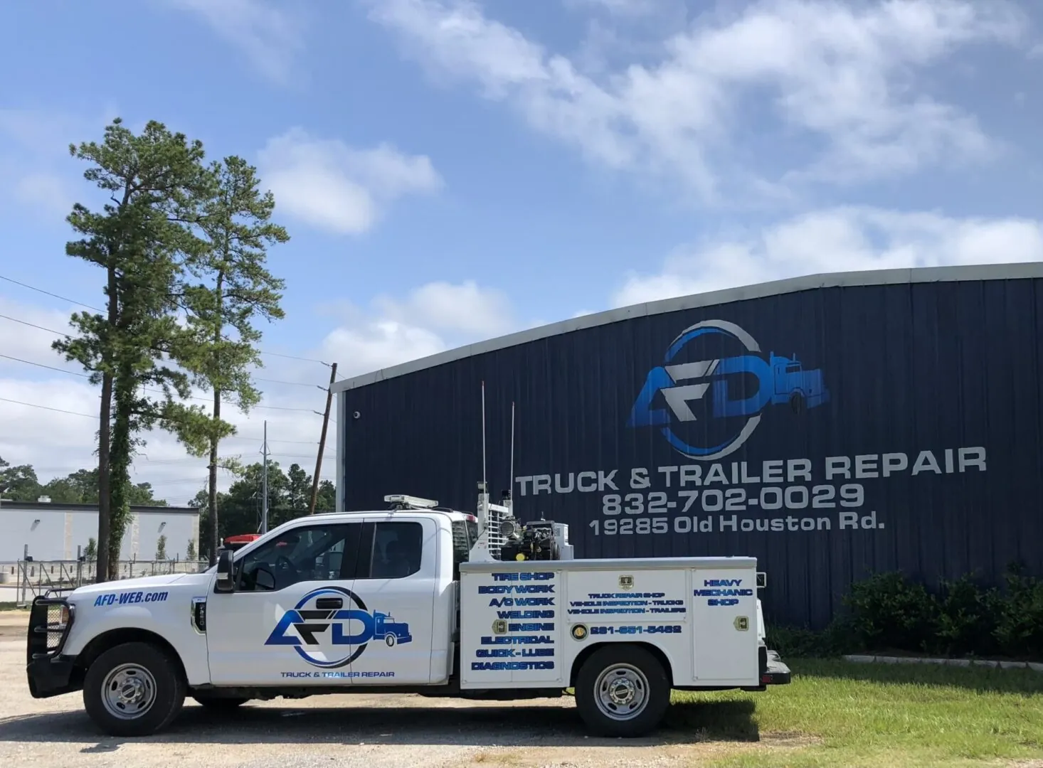 AFD service truck parked by repair shop